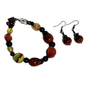 Set of ladybug glass bead bracelet and earrings